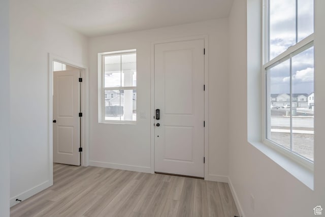 1686 N 800 W, Salem, UT 84653 - foyer with plenty of natural light, light wood-style floors, and baseboards