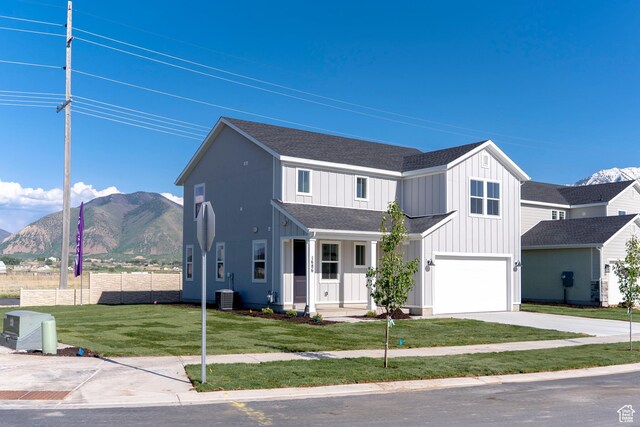1686 N 800 W, Salem, UT 84653 - modern inspired farmhouse featuring a mountain view, central air condition unit, a shingled roof, driveway, and an attached garage