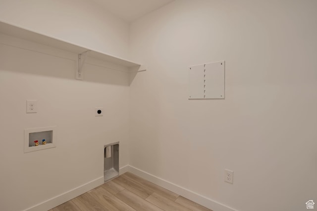 1686 N 800 W, Salem, UT 84653 - laundry area with baseboards, light wood finished floors, washer hookup, and hookup for an electric dryer