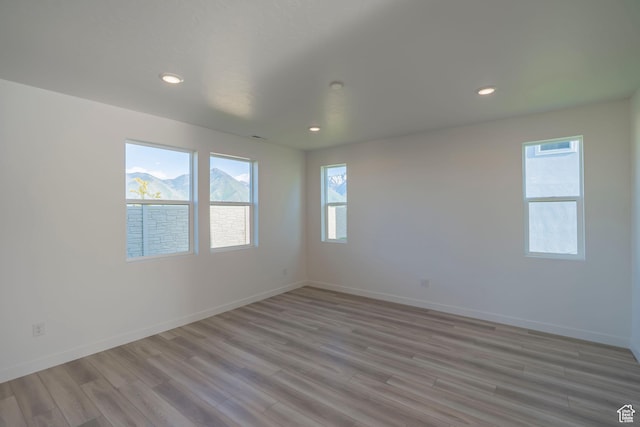 1656 N 800 W, Salem, UT 84653 - unfurnished room featuring light wood-style floors, baseboards, and recessed lighting