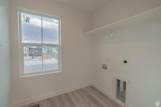 1656 N 800 W, Salem, UT 84653 - laundry area with washer hookup, light wood-style flooring, baseboards, and electric dryer hookup