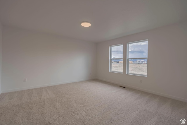 1678 N 800 W, Salem, UT 84653 - spare room featuring light carpet and baseboards