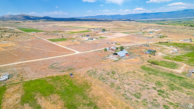 aerial view featuring a rural view and a mountain view