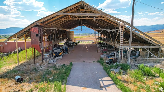 view of parking featuring a mountain view