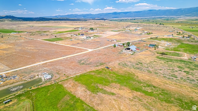 bird's eye view with a mountain view and a rural view