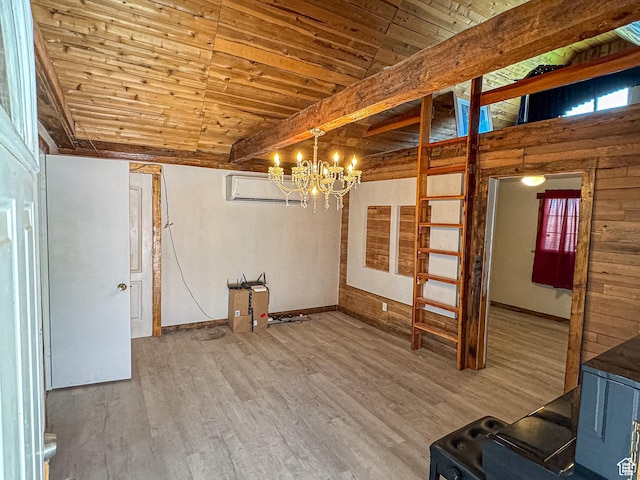 unfurnished room with beamed ceiling, wood finished floors, wood ceiling, and baseboards