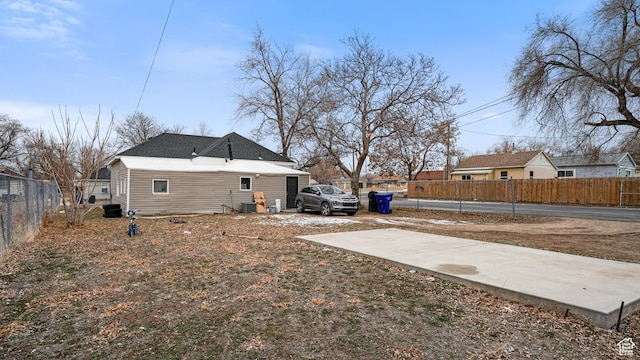 2812 S 9150 W, Magna, UT 84044 - back of house featuring a residential view and fence