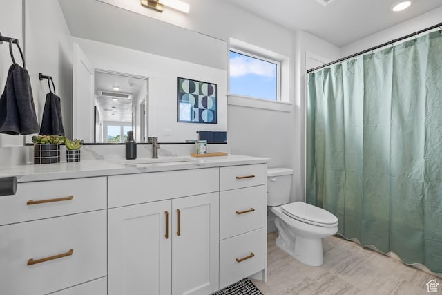 2452 W 2950 N Unit 112, Farr West, UT 84404 - full bath with toilet, wood finished floors, and vanity