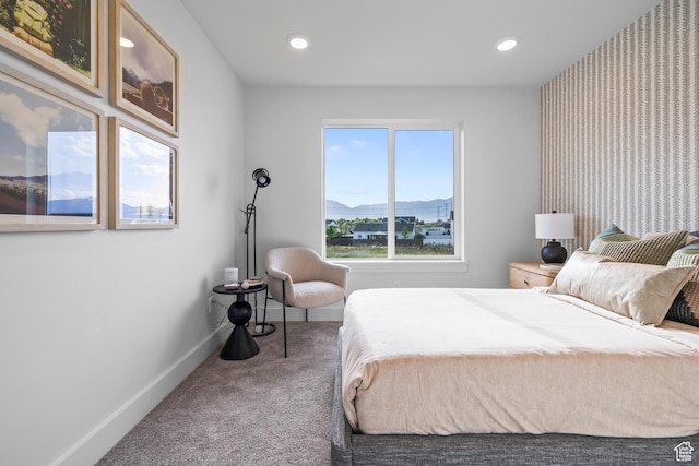 2452 W 2950 N Unit 112, Farr West, UT 84404 - carpeted bedroom featuring recessed lighting, a mountain view, and baseboards