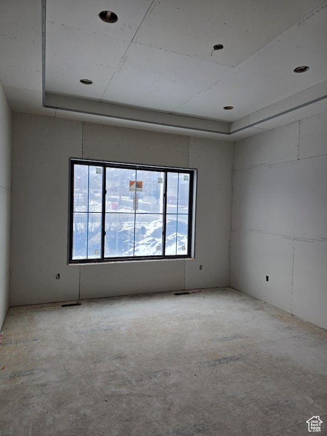 1419 E Heights Way, Fruit Heights, UT 84037 - spare room featuring concrete flooring and plenty of natural light