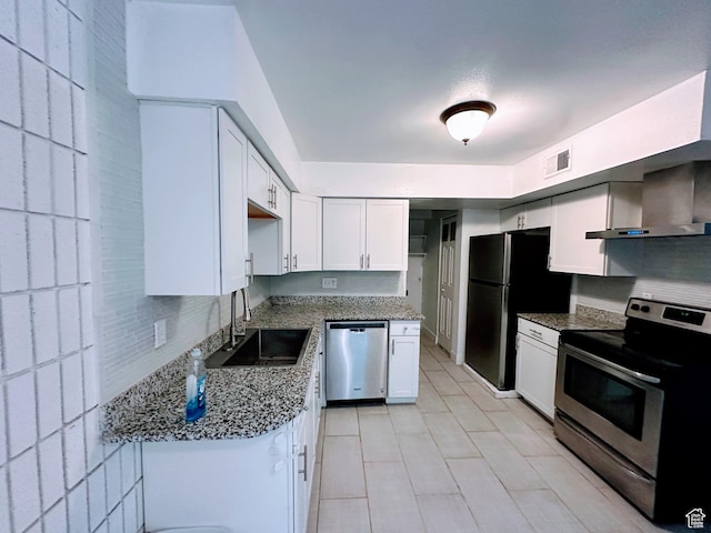 1866 W Homestead Farms Ln S Unit 1, Salt Lake City, UT 84119 - kitchen with stainless steel appliances, a sink, visible vents, white cabinets, and light stone countertops