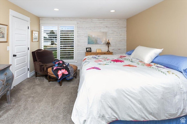 carpeted bedroom with recessed lighting