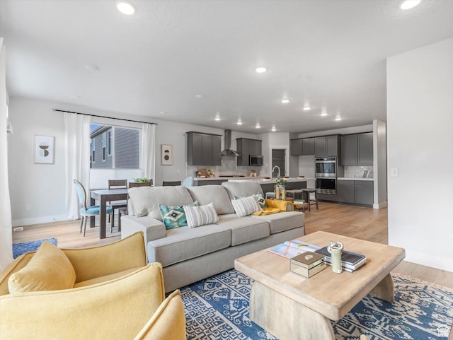 14678 S Silver Blossom Way E, Draper, UT 84020 - living room with light wood-style flooring and recessed lighting
