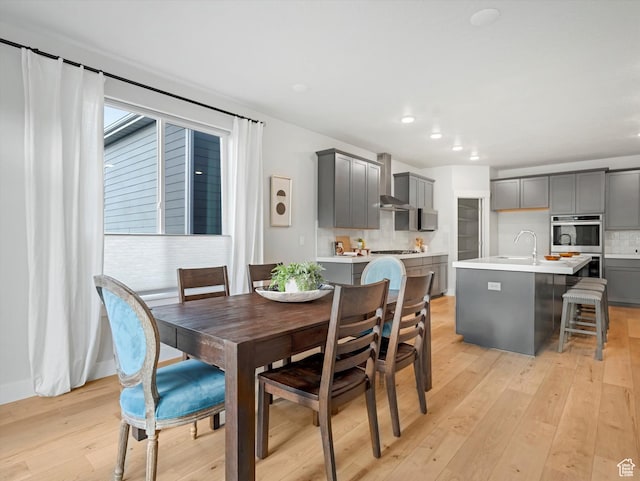 14678 S Silver Blossom Way E, Draper, UT 84020 - dining area featuring light wood-type flooring and recessed lighting