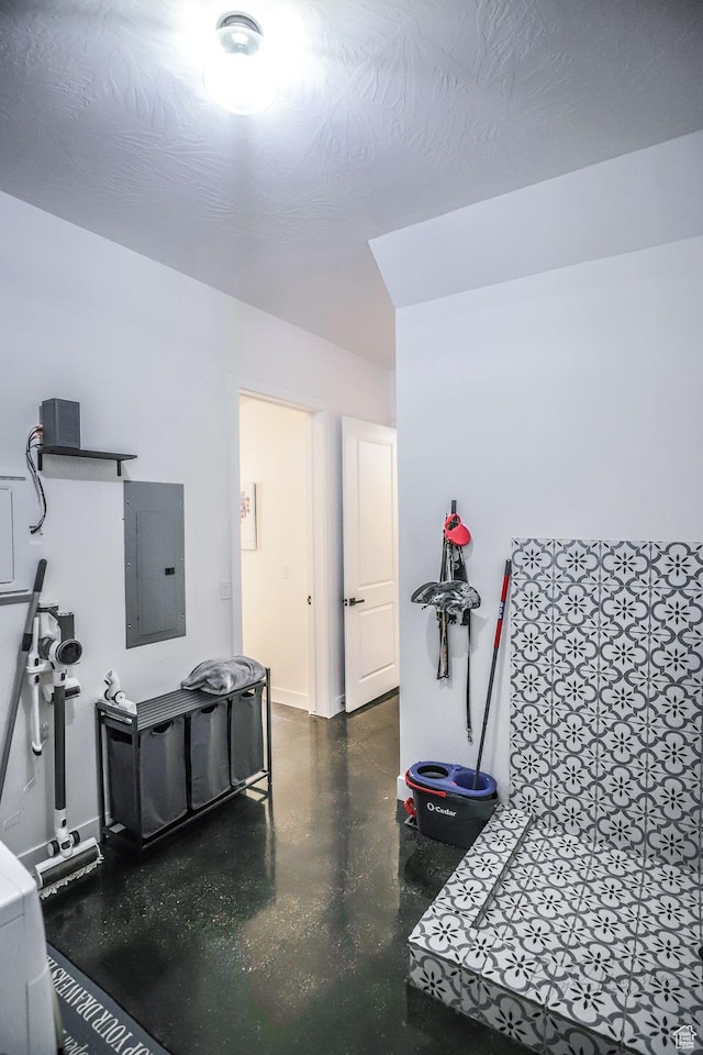 2906 N Purple Sage Rd, Apple Valley, UT 84737 - playroom with electric panel, concrete floors, and baseboards