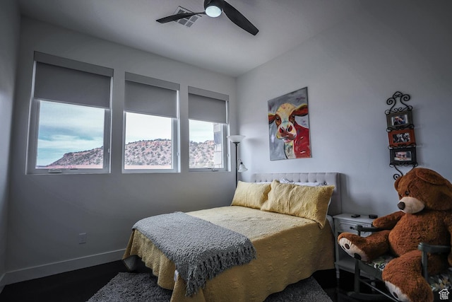 2906 N Purple Sage Rd, Apple Valley, UT 84737 - bedroom with ceiling fan and baseboards