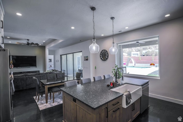 2906 N Purple Sage Rd, Apple Valley, UT 84737 - kitchen with a sink, stainless steel appliances, ceiling fan, recessed lighting, and a center island with sink