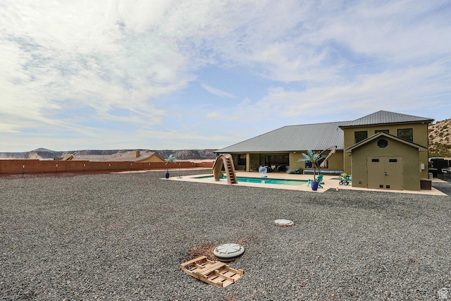 2906 N Purple Sage Rd, Apple Valley, UT 84737 - view of yard featuring a patio and fence