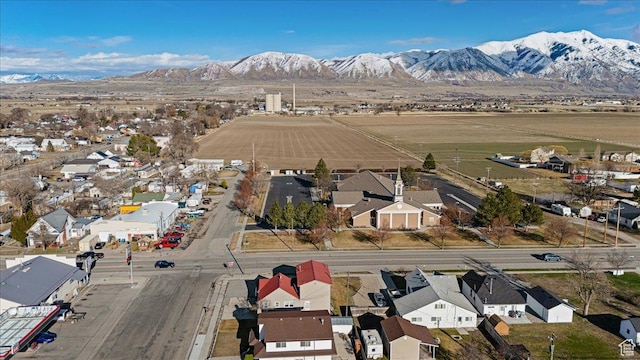 aerial view featuring a mountain view and a residential view