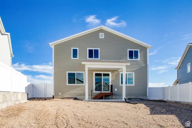 7181 Woods Rose Dr, Park City, UT 84098 - back of property featuring a fenced backyard and a gate