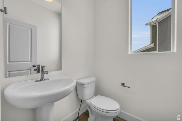 7181 Woods Rose Dr, Park City, UT 84098 - bathroom with baseboards, toilet, and a sink