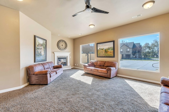289 S 1000 W Unit 204, Pleasant Grove, UT 84062 - carpeted living room featuring baseboards, visible vents, a ceiling fan, and a glass covered fireplace