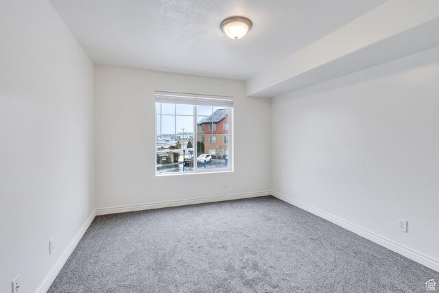 289 S 1000 W Unit 204, Pleasant Grove, UT 84062 - carpeted spare room featuring baseboards