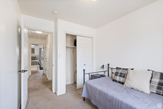 984 N Independence Ave W, Provo, UT 84604 - bedroom featuring attic access, baseboards, a closet, and light colored carpet