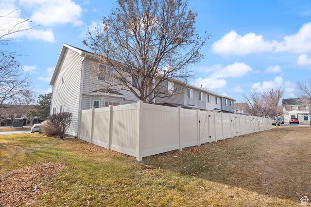 984 N Independence Ave W, Provo, UT 84604 - view of home's exterior with a yard and fence