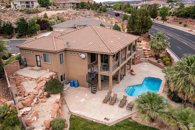 1163 W Sunrise Cir, Washington, UT 84780 - exterior space featuring a fenced in pool, a patio, fence, and stairs