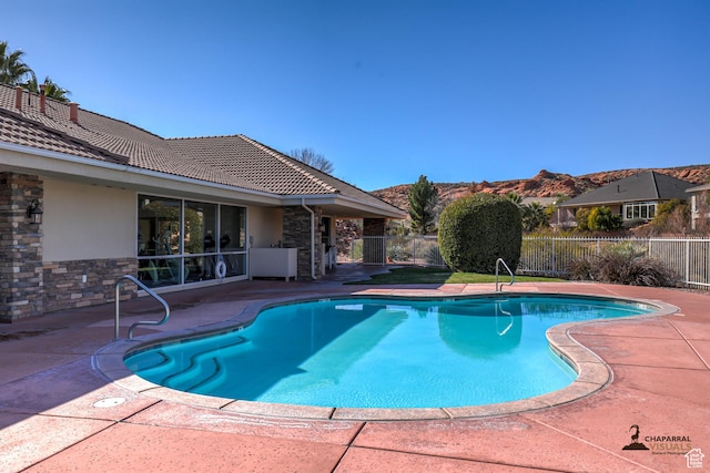 1163 W Sunrise Cir, Washington, UT 84780 - view of swimming pool featuring a patio area, fence, and a fenced in pool