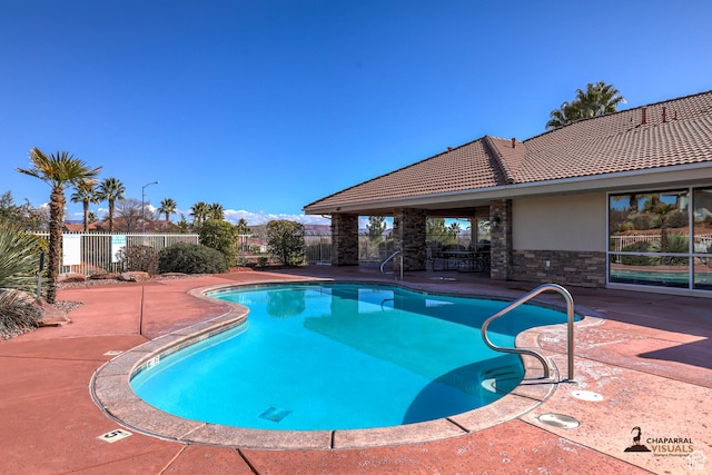 1163 W Sunrise Cir, Washington, UT 84780 - pool with a patio area and fence