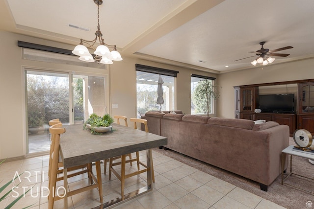1109 N Ventana Dr, Washington, UT 84780 - dining space featuring light tile patterned floors, ceiling fan with notable chandelier, and visible vents