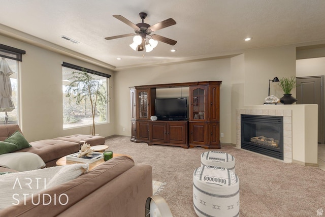 1109 N Ventana Dr, Washington, UT 84780 - living room with recessed lighting, light carpet, a fireplace, and visible vents