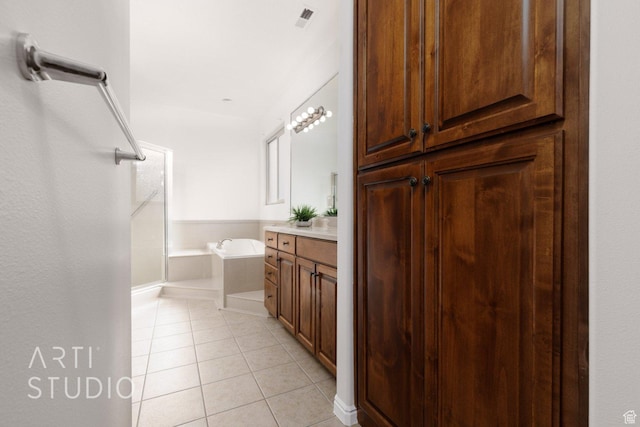 1109 N Ventana Dr, Washington, UT 84780 - full bathroom with a closet, tile patterned flooring, a garden tub, and vanity