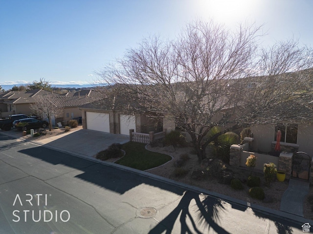 1109 N Ventana Dr, Washington, UT 84780 - single story home featuring driveway and an attached garage