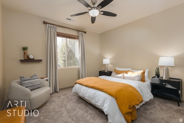 1109 N Ventana Dr, Washington, UT 84780 - bedroom featuring light carpet, visible vents, and a ceiling fan