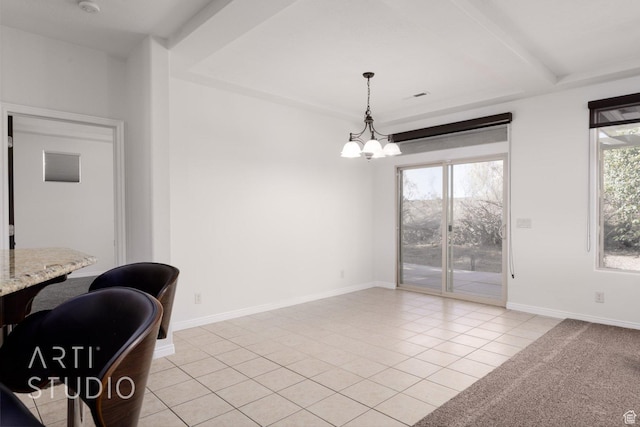 1109 N Ventana Dr, Washington, UT 84780 - dining space featuring light tile patterned floors, baseboards, and a notable chandelier