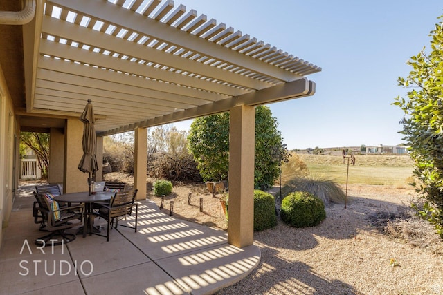1109 N Ventana Dr, Washington, UT 84780 - view of patio with outdoor dining area and a pergola
