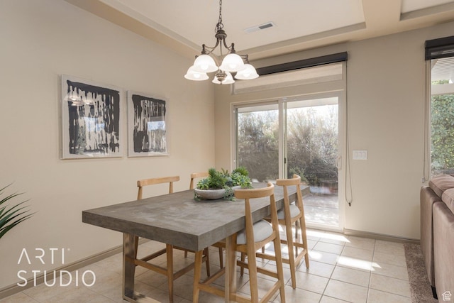 1109 N Ventana Dr, Washington, UT 84780 - dining space featuring a notable chandelier, a raised ceiling, visible vents, light tile patterned flooring, and baseboards