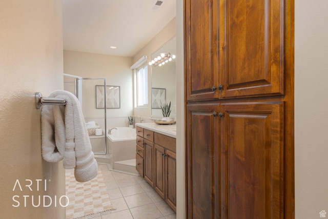 1109 N Ventana Dr, Washington, UT 84780 - bathroom featuring visible vents, tile patterned floors, vanity, a shower stall, and a bath