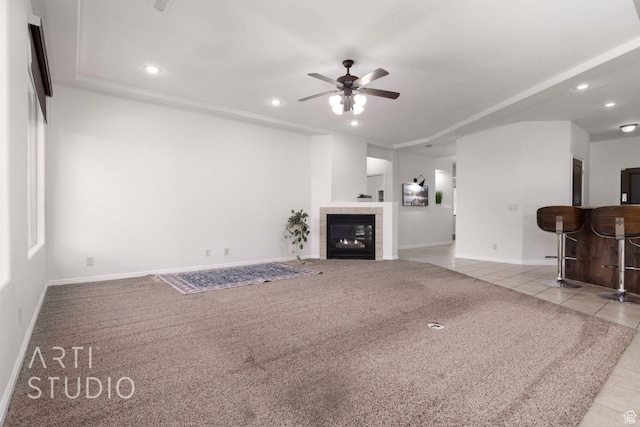 1109 N Ventana Dr, Washington, UT 84780 - unfurnished living room featuring recessed lighting, ceiling fan, light tile patterned floors, baseboards, and a tiled fireplace
