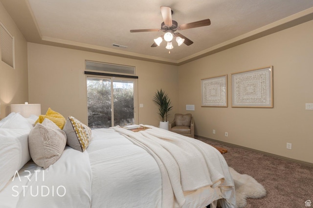1109 N Ventana Dr, Washington, UT 84780 - carpeted bedroom with a ceiling fan, baseboards, visible vents, access to exterior, and a tray ceiling