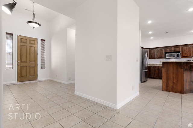 1109 N Ventana Dr, Washington, UT 84780 - foyer entrance featuring light tile patterned floors, recessed lighting, and baseboards
