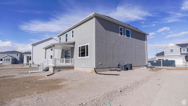 exterior space with covered porch and a residential view