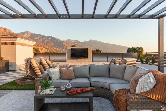 2250 E Murray Holladay Rd Unit 205, Holladay, UT 84117 - view of patio featuring outdoor lounge area and a pergola