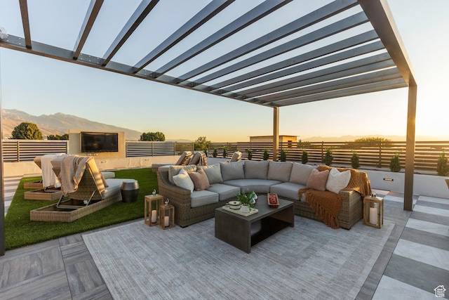 2250 E Murray Holladay Rd Unit 205, Holladay, UT 84117 - view of patio / terrace with fence, outdoor lounge area, and a pergola