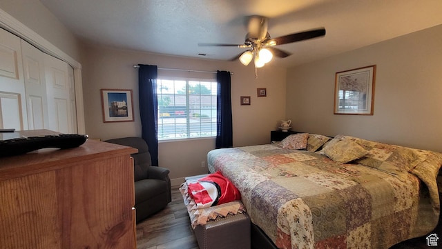 657 W 150 S, Hurricane, UT 84737 - bedroom with visible vents, a closet, a ceiling fan, and dark wood-style flooring