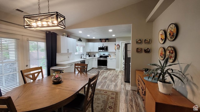 657 W 150 S, Hurricane, UT 84737 - dining space with visible vents, baseboards, light wood-style flooring, vaulted ceiling, and recessed lighting