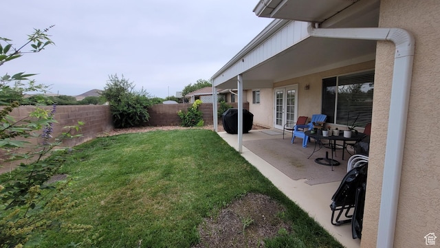 657 W 150 S, Hurricane, UT 84737 - view of yard featuring french doors, a fenced backyard, and a patio